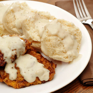 COUNTRY FRIED STEAK DINNER WITH HANDMADE BUTTERMILK BISCUITS